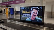 NZ - DOOH entertains in Baggage Reclaim