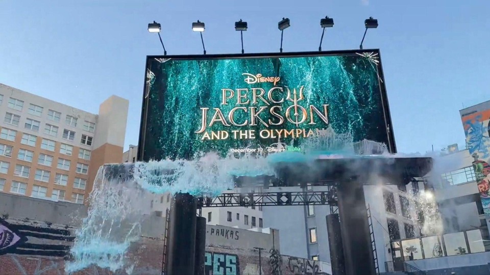 Disney�s Percy Jackson anamorphic OOH installation: a 3D billboard with crashing water spilling out toward the street